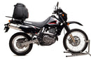 The image displays the EVO-12 Bike-Pack Kit from Ventura, featuring a versatile black EVO-12 Pack, an adjustable EVO-Rack mounted on a Suzuki DR 650 SE (97 - >), and an L-Bracket with screws arranged below. Each component is clearly labeled with its name.