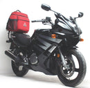 The EVO-12 Bike-Pack Kit features a sleek black storage bag, Evo-Rack metal frame for secure mounting, and an essential L-bracket with screws, ideal for an adventurous sport-rack setup on the Suzuki GS 500 F (04 - 12) by Ventura.