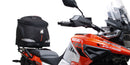 Ventura's EVO-12 Bike-Pack Kit image features a striking black EVO-12 pack with vibrant orange accents, an EVO-Rack gracefully fitted on a Suzuki DL 1050 V-Strom XT bike, and an L-Bracket with screws. The Adjustable Pack-Rack is designed to enhance your biking experience.