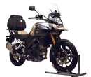 The image showcases the EVO-12 Bike-Pack Kit with a sleek black pack, zipper, and logo. It includes an adjustable Evo-Rack for easy attachment to the Suzuki DL 650 V-Storm and an L-bracket with mounting hardware—all labeled as a generic image from Ventura.