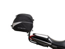 Ventura EVO-12 Bike-Pack Kit for Suzuki GSXS 1000S Katana (19->) includes a black EVO-12 pack, Evo-Rack mounted on a bike, and an L-Bracket with mounting hardware. Each item is clearly labeled for easy identification.