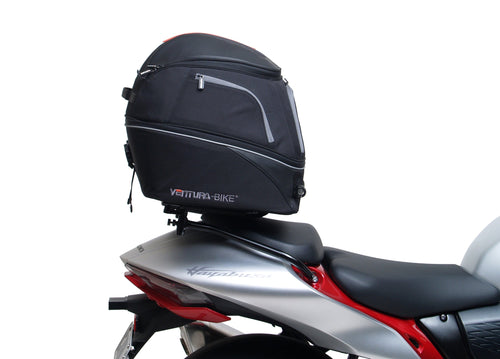 Image displaying a Ventura EVO-12 Bike-Pack Kit for Suzuki GSX 1300 R Hayabusa Gen III (21→), with a black EVO-12 pack, Evo-Rack Sport-Rack on the motorcycle, and labeled L-bracket with screws on a white background.