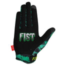 The DANIEL SANDOVAL - SANDMAN GLOVE by FIST features a bold green, black, and gray graphic with jagged shapes and teeth. "FIST" is printed in yellow on the fingers, plus a red "FIST" tag at the wrist.