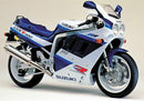 Image showing the Ventura EVO-12 Bike-Pack Kit for Suzuki GSXR 750 J, K, L, featuring an EVO-12 pack, Evo-Rack mounted on the motorcycle, and a labeled L-bracket with mounting hardware.