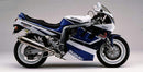 Image showing the Ventura EVO-12 Bike-Pack Kit on a Suzuki GSXR 750 M with an Evo-Rack, EVO-12 pack, and L-bracket with screws, all clearly labeled to illustrate each part for easy identification.