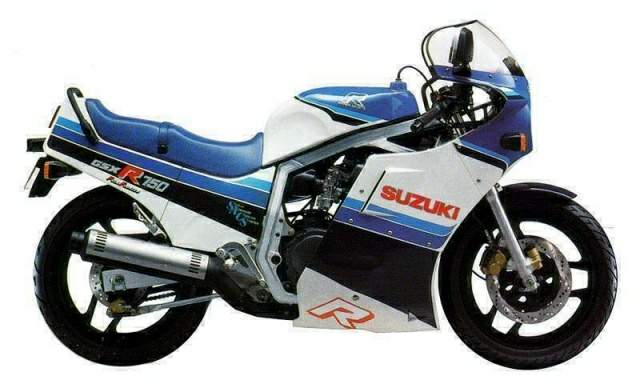 The Ventura EVO-12 Bike-Pack Kit for Suzuki GSXR 750 F, G includes a black EVO-12 pack, metal Adjustable Pack-Rack, and L-Bracket with screws and hardware—all clearly labeled for easy identification.
