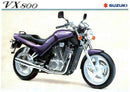 Image showing a Ventura EVO-12 Bike-Pack Kit for Suzuki VX 800 M, with Evo-Rack mounted on bike, EVO-12 pack, and L-Bracket (with screws and rods). Each Ventura item is clearly labeled for easy identification.