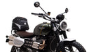 Image shows a Ventura EVO-12 bike-pack kit for Triumph Scrambler 1200 XE, XC (19->), featuring a black zippered pack, Evo-Rack Top-Box Rack on the bike, and L-Bracket with hardware (generic image shown).
