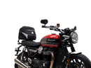 Image shows three labeled Ventura items for the Triumph Speed Twin 1200 (19->): an EVO-12 Pack (compact black bag), Evo-Rack adjustable rack mounted on the motorcycle, and a generic L-Bracket with bolts.