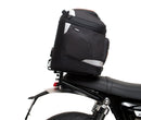 Image shows three labeled Ventura items for the Triumph Speed Twin 1200 (19->): an EVO-12 Pack (compact black bag), Evo-Rack adjustable rack mounted on the motorcycle, and a generic L-Bracket with bolts.