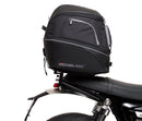 Image shows three labeled Ventura items for the Triumph Speed Twin 1200 (19->): an EVO-12 Pack (compact black bag), Evo-Rack adjustable rack mounted on the motorcycle, and a generic L-Bracket with bolts.