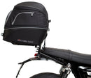 Image shows three labeled Ventura items for the Triumph Speed Twin 1200 (19->): an EVO-12 Pack (compact black bag), Evo-Rack adjustable rack mounted on the motorcycle, and a generic L-Bracket with bolts.