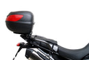The Ventura EVO-12 Bike-Pack Kit for Triumph Tiger 900 GT Pro, Rally Pro (20->) includes a black EVO-12 pack, Evo-Rack mounted on the bike, and an image of a metal L-bracket kit with screws—each item clearly labeled.