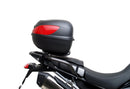 The Ventura EVO-12 Bike-Pack Kit for Triumph Tiger 900 GT Pro, Rally Pro (20->) includes a black EVO-12 pack, Evo-Rack mounted on the bike, and an image of a metal L-bracket kit with screws—each item clearly labeled.
