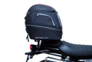 The Ventura EVO-12 Bike-Pack Kit for Triumph Street Scrambler 900 (2021 - >) includes a black EVO-12 Pack, Evo-Rack Top-Box Rack, and labeled L-bracket with screws, all displayed on a white background.