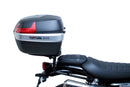 The Ventura EVO-12 Bike-Pack Kit for Triumph Street Scrambler 900 (2021 - >) includes a black EVO-12 Pack, Evo-Rack Top-Box Rack, and labeled L-bracket with screws, all displayed on a white background.