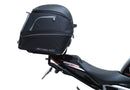 Image showing the Ventura EVO-12 Bike-Pack Kit for Triumph Speed Triple 1200 RS, RR (21 ->), featuring a black EVO-12 Pack tail bag, Evo-Rack Top-Box Rack, and an L-Bracket with screws and mounting hardware.