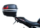 Image showing the Ventura EVO-12 Bike-Pack Kit for Triumph Speed Triple 1200 RS, RR (21 ->), featuring a black EVO-12 Pack tail bag, Evo-Rack Top-Box Rack, and an L-Bracket with screws and mounting hardware.