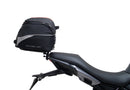 Image shows a Ventura EVO-12 bike pack, Adjustable Pack-Rack, and labeled "L-Bracket" with mounting hardware on a Triumph Tiger Sport 660 (22 ->), displayed as a bike-pack kit. Text labels identify each Ventura component.