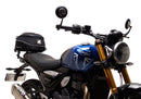 Image showing three components for the Ventura EVO-12 Bike-Pack Kit on a Triumph Scrambler 400X (24->): the EVO-12 pack (black bag), EVO-rack Sport-Rack (metal rack), and L-Bracket with hardware, each labeled with text.