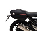 Image showing three components for the Ventura EVO-12 Bike-Pack Kit on a Triumph Scrambler 400X (24->): the EVO-12 pack (black bag), EVO-rack Sport-Rack (metal rack), and L-Bracket with hardware, each labeled with text.