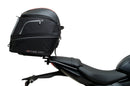Ventura's EVO-12 Bike-Pack Kit for Triumph Daytona 660 (24 - >) includes a black zippered bike-pack, metal rear rack like the Evo-Rack, and metal L-brackets with screws depicted as a generic image.