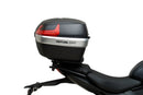 Ventura's EVO-12 Bike-Pack Kit for Triumph Daytona 660 (24 - >) includes a black zippered bike-pack, metal rear rack like the Evo-Rack, and metal L-brackets with screws depicted as a generic image.