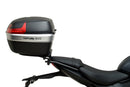 Ventura's EVO-12 Bike-Pack Kit for Triumph Daytona 660 (24 - >) includes a black zippered bike-pack, metal rear rack like the Evo-Rack, and metal L-brackets with screws depicted as a generic image.