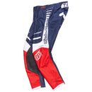 The Troy Lee Designs YOUTH GP PRO PANT BLENDS in navy/orange features a logo on the side and near the knee, made from durable 600D polyester for top performance in youth moto kits.