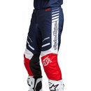 The Troy Lee Designs YOUTH GP PRO PANT BLENDS in navy/orange features a logo on the side and near the knee, made from durable 600D polyester for top performance in youth moto kits.