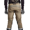 The Troy Lee Designs GP PRO PANTS MONO OAK in beige feature reinforced knee panels, mesh ventilation for performance, and a vertical "Troy Lee Designs" logo on the right leg. Shown flat on a white background.