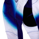The Troy Lee Designs SE ULTRA PANT BLURR BLUE features blue, white, and black colors, "Troy Lee Designs" side script, mesh ventilation panels, TLD Ultra Tech materials, and an “ULTRA” elastic waistband for comfort and Precision Fit on any ride.