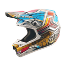 The Troy Lee Designs SE5 ECE CARBON HELMET LOWRIDER SILVER features a colorful, advanced geometric design with bold lines in blue, red, yellow, and white, "Troy Lee Designs" on the visor, intricate side detailing, and a lightweight carbon shell.