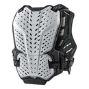 The Troy Lee Designs ROCKFIGHT CHEST PROTECTOR WHITE features a white and black design, perforated panels, adjustable shoulder straps, side buckles, and meets CE EN14021 for reliable impact protection in sports or motocross.