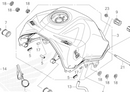 Exploded technical diagram of a Honda Fuel Tank Assembly - Transalp XL750 2023. The illustration includes the tank and surrounding components, marked with numbers for reference. Several parts such as screws, caps, and pipes are shown detached and labeled with corresponding numbers.
