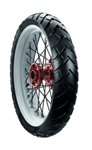 A spoked wheel features an Avon Trekrider tire with a black tread, ideal for multi-terrain use. The hub is metallic red, and "Avon Tyres" marks the sidewall. Set against a plain backdrop, it's ready to conquer any path.