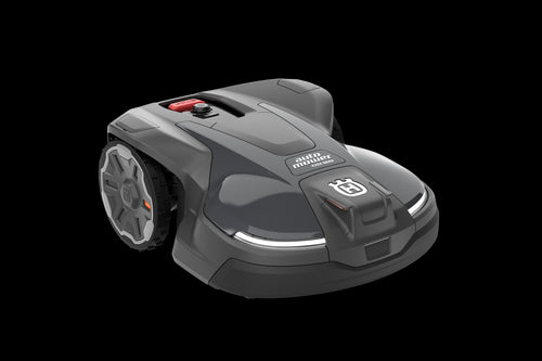 The Husqvarna Automower® 430X NERA is a sleek, dark gray robotic lawn mower with large wheels and a compact build, labeled "Automower" on top, and features smart control via the Automower Connect app.