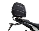 Ventura EVO-12 Bike-Pack Kit for Yamaha Tracer 900 GT (19-21) includes a black EVO-12 pack, an EVO-RACK Top-Box Rack, and an L-Bracket with screws/bolts, each item labeled with a red tag.