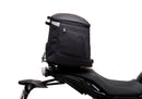 The Ventura EVO-12 Bike-Pack Kit for Yamaha Tracer 7 (23>) includes a black tail bag, EVO-RACK metal Sport-Rack, L-brackets with screws, all shown on a white background with product labels.