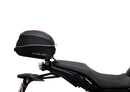 The Ventura EVO-12 Bike-Pack Kit for Yamaha Tracer 7 (23>) includes a black tail bag, EVO-RACK metal Sport-Rack, L-brackets with screws, all shown on a white background with product labels.