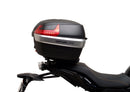 The Ventura EVO-12 Bike-Pack Kit for Yamaha Tracer 7 (23>) includes a black tail bag, EVO-RACK metal Sport-Rack, L-brackets with screws, all shown on a white background with product labels.