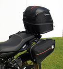 The Ventura EVO-12 Bike-Pack Kit for Yamaha Tracer 7 (23>) includes a black tail bag, EVO-RACK metal Sport-Rack, L-brackets with screws, all shown on a white background with product labels.