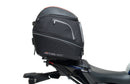 Image showing the Ventura EVO-12 Bike-Pack Kit for Yamaha MT-09, SP, Y-AMT (24->), with three labeled items: EVO-12 Pack (compact black bag), Evo-Rack (metal pack-rack on bike), and L-Bracket (black brackets with screws).