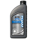 A gray BELRAY plastic bottle of their Foam Filter Oil, optimized for foam type filters, boosts airflow and engine protection. The label emphasizes its role in extending filter life. This bottle is available in a 1 liter (33.8 fl oz) size.