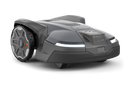 The image shows a Husqvarna Automower® 450X NERA robotic lawn mower. It features a sleek, gray and black design with LED headlights, large rubber wheels, and a red power button. The Husqvarna logo and model name are visible on the body. Integrated with object avoidance and compatible with the Automower Connect app.