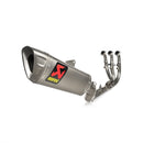 The Full System Yamaha R9 by AKRAPOVIC features a metallic finish, titanium muffler with the AKRAPOVIC logo in red and yellow, and three exhaust pipes extending from the main body.