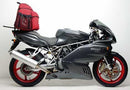 The image shows the Ventura EVO-12 Bike-Pack Kit for Ducati 1000 Supersport DS (03-06), featuring a black EVO-12 pack, metal Evo-Rack on a motorcycle, and L-bracket with screws. All components are labeled for clear identification.
