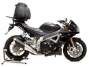 The image displays a Ventura EVO-12 Bike-Pack Kit, including the compact black EVO-12 bag with a zipper, an EVO-Rack, and an L-bracket with screws. The metallic rack integrates seamlessly with any Adjustable Pack-Rack system for easy mounting on the Aprilia Tuono V4 (11-20).