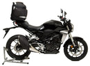 The EVO-12 Bike-Pack Kit image showcases a black bike-pack and an EVO-rack with ample mounting space, detailed with a sleek Adjustable Pack-Rack. This versatile kit for the Honda CB 300 RA (18 - >) by Ventura includes an L-bracket, screws, and bolts for hassle-free assembly.