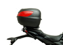 Image showcasing a Ventura EVO-12 Bike-Pack Kit containing three components: a black and gray EVO-12 pack with zipper, an Evo-Rack on a Honda CB 650R/CBR 650R (19-20) for stability, and L-brackets with screws, all in this generic image.